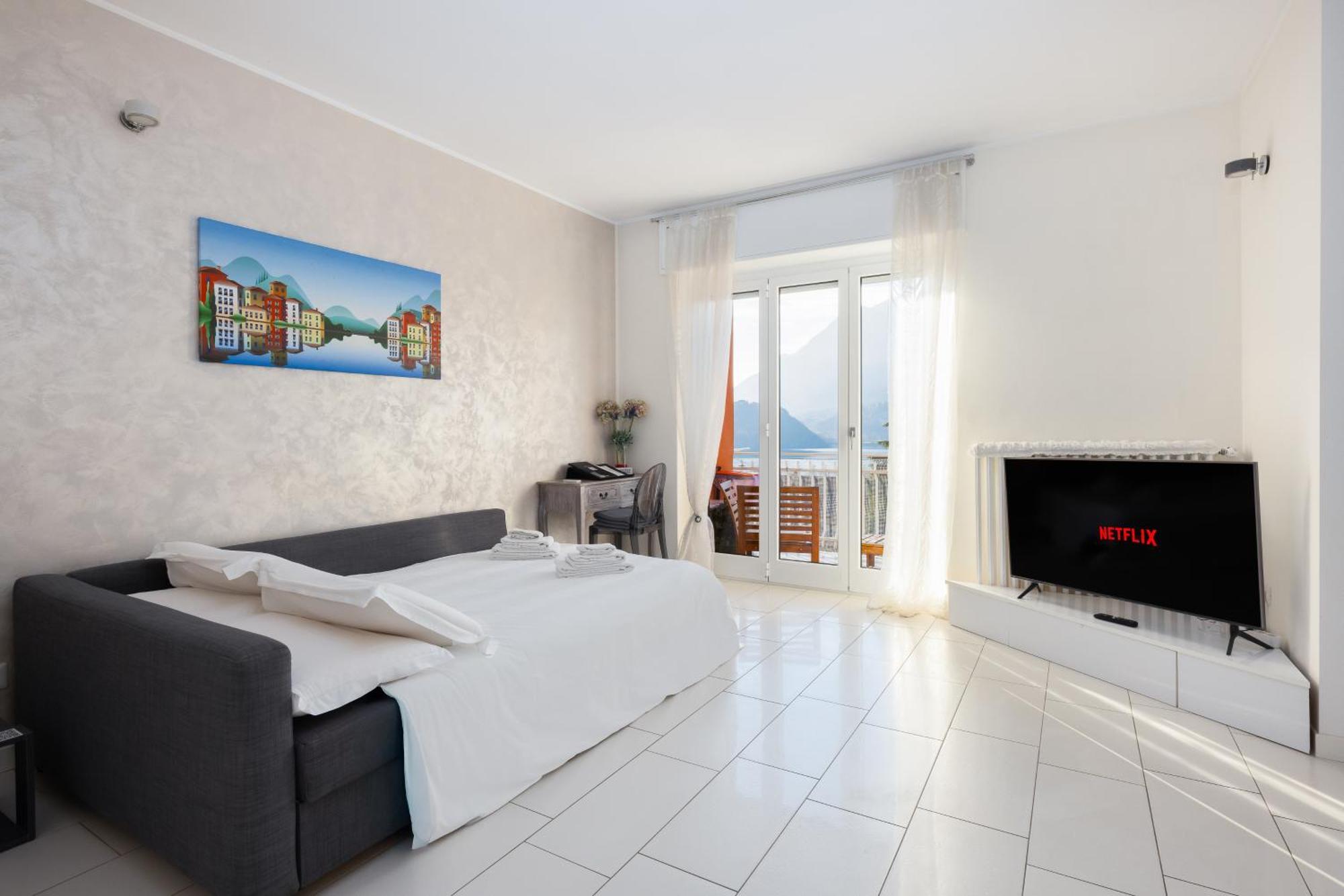 Terrazza Sul Lago - Open Space E Netflix Lecco Dış mekan fotoğraf
